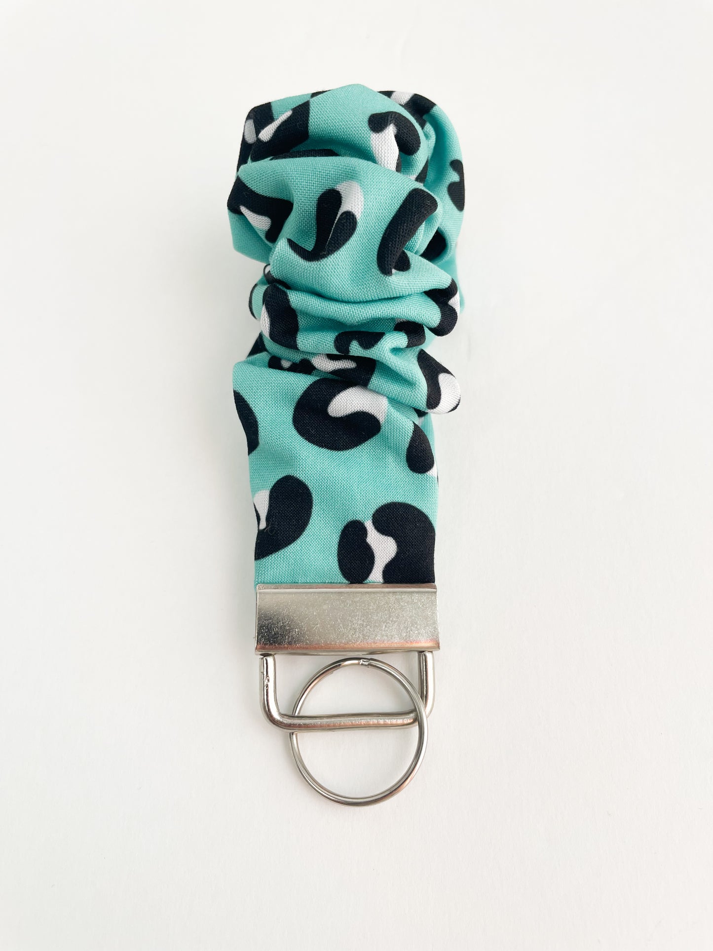 Mint Leopard Wristlet