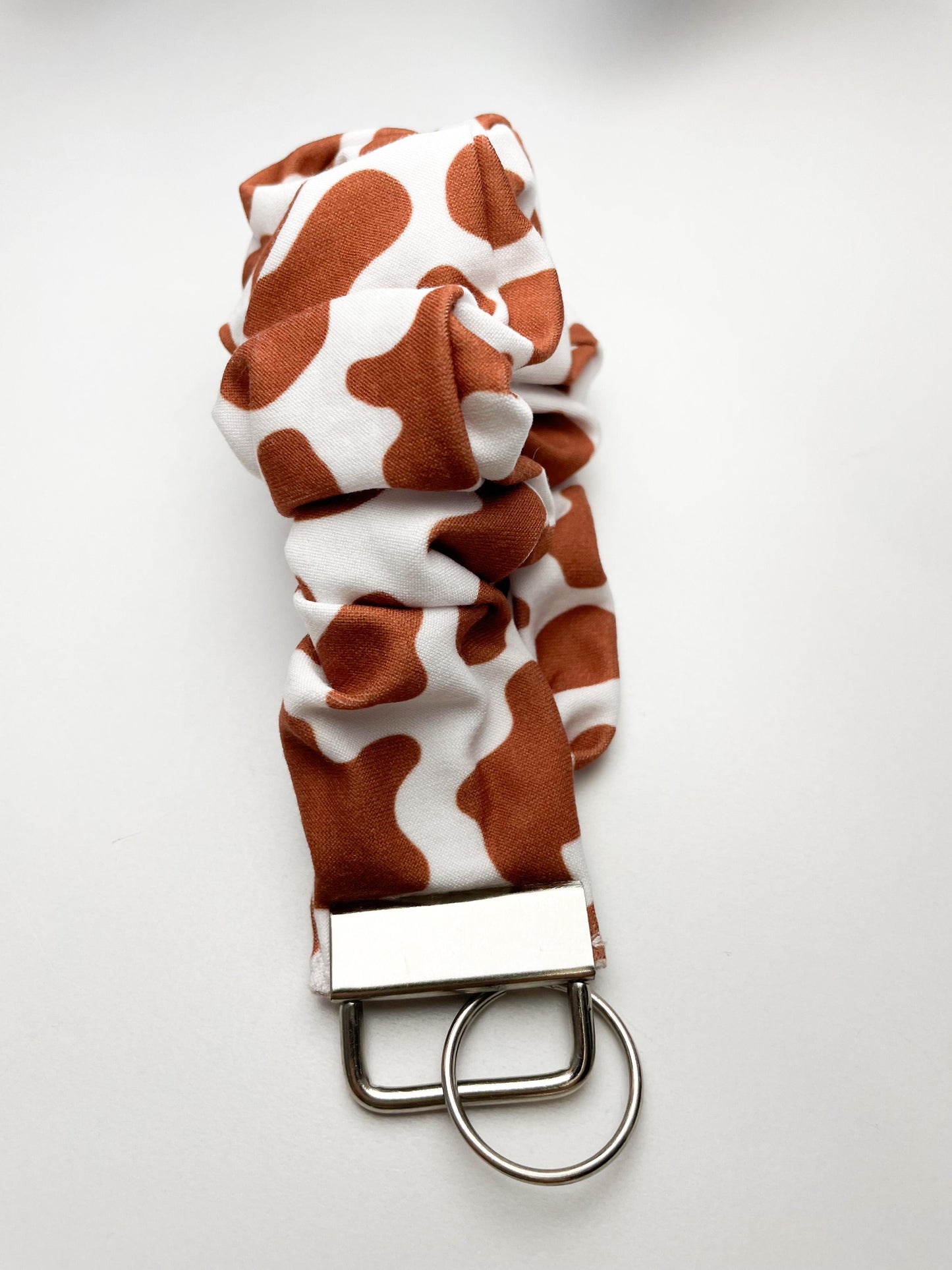 Brown Cow Wristlet